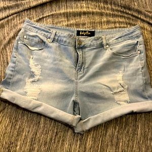 Light wash, distressed, stretch denim shorts size 20